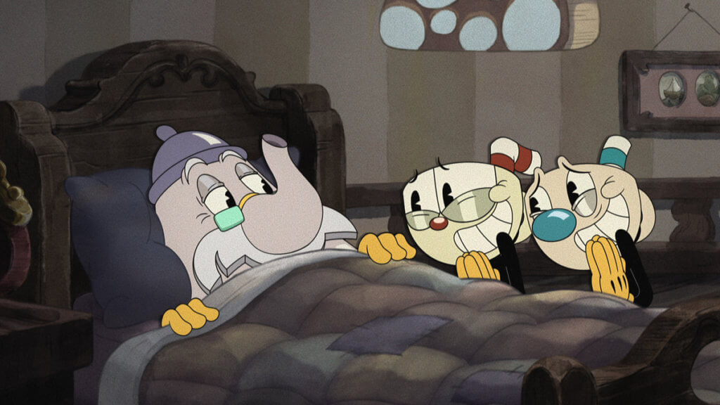Xicrinho e Caneco, os principais, sorindo, com cara de que estão aprontando, para seu avô Chaleira, deitado na cama 